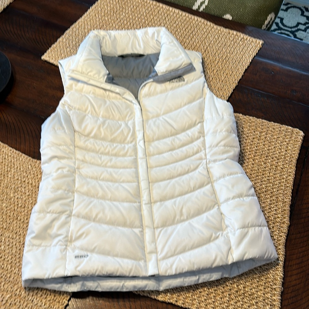 The North face white puffer vest. New without tags